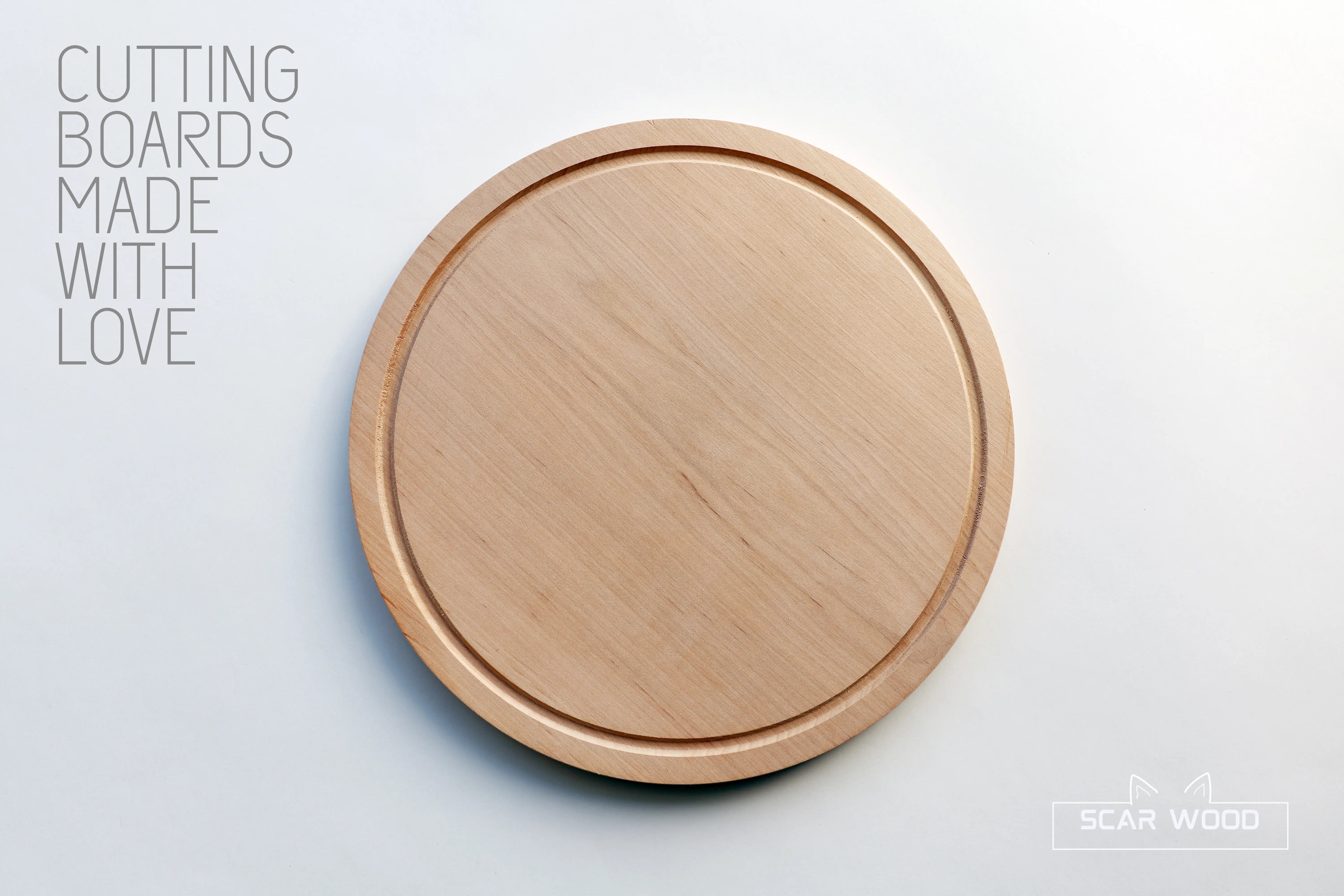 Kleine (26cm) Ronde Elzenhouten Snijplank met Sapgeul